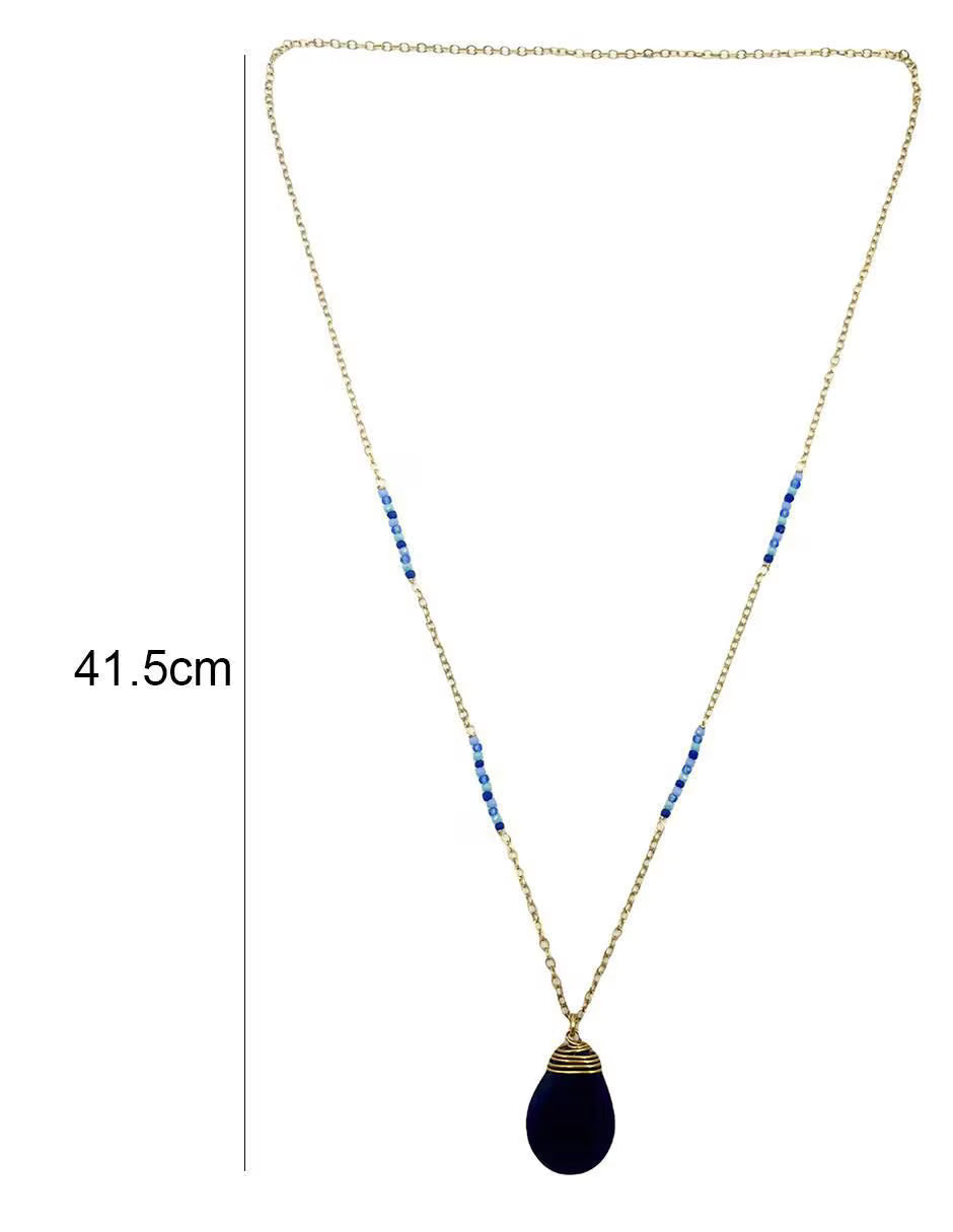 Set de arracadas y collar con piedra azul en chapa de oro de 14 k