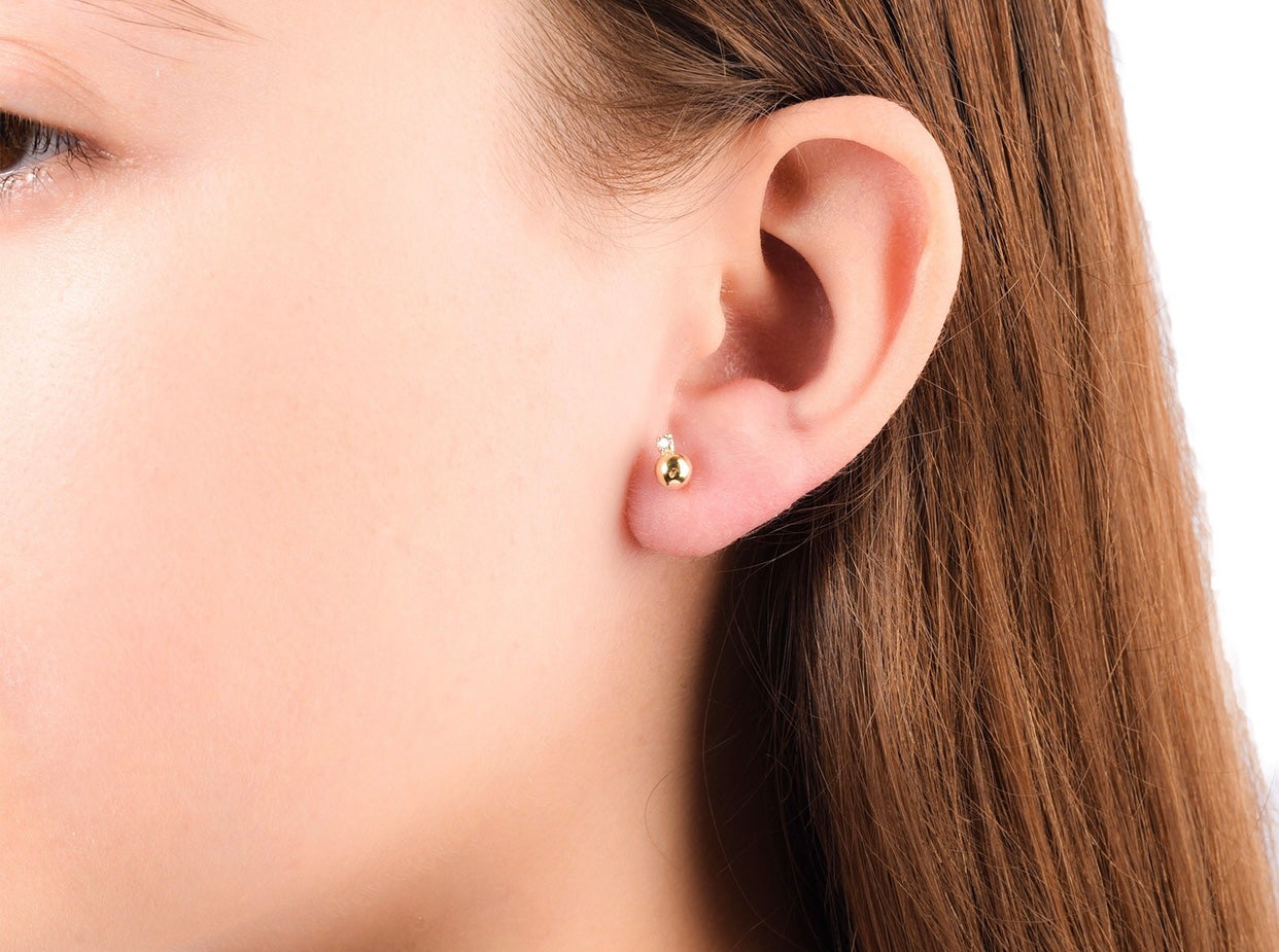 Broquel Bola Lisa con Zirconia en Oro 10k