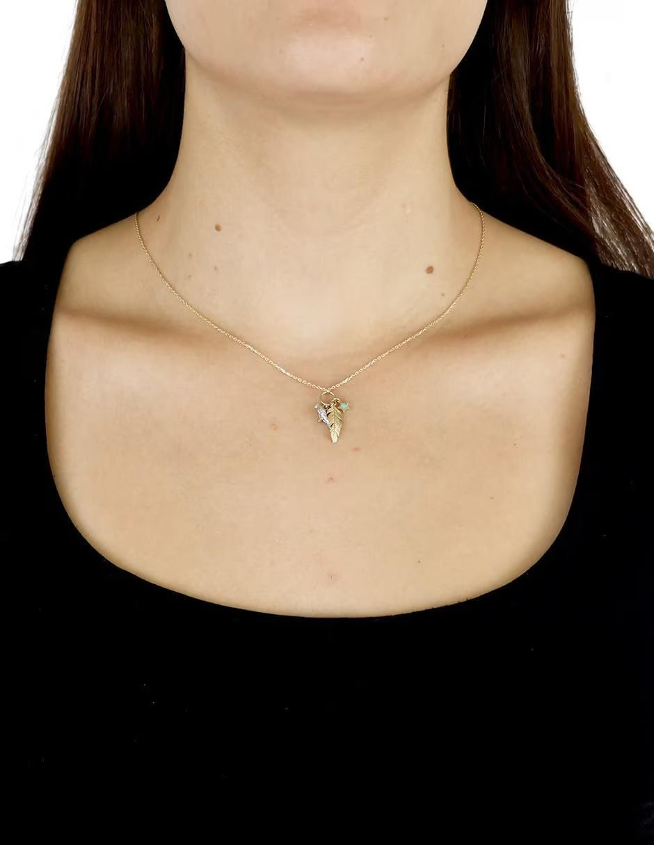 Collar con Dije de Pajaro y Pluma en Oro de 10k